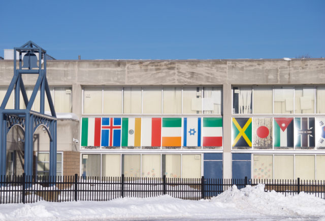 Various flags on a building