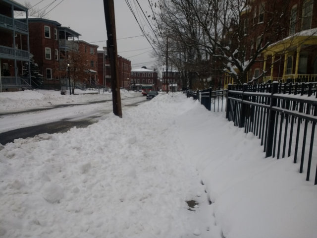 Ice plowed onto the sidewalk by City of Hartford