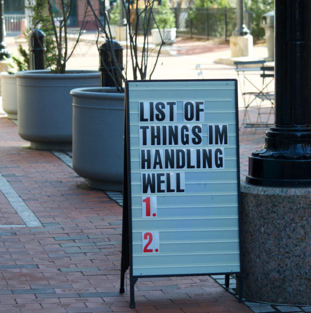 Sign that says "List of Things I'm Handling Well" with nothing filled in 