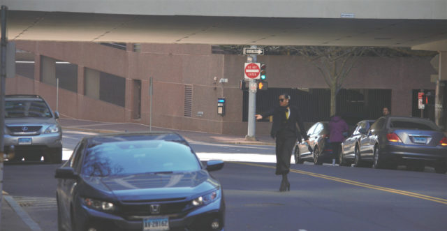 Woman crossing street