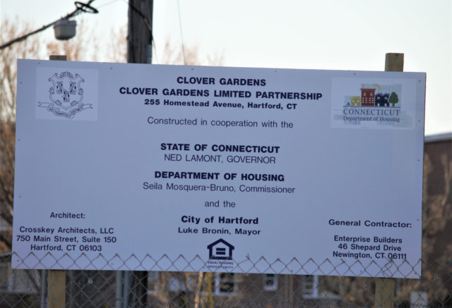 Sign describing who is responsible for Clover Garden project