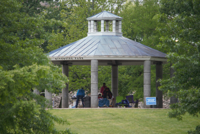 People having picnic under pavilion