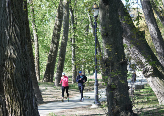 People jogging along CT River